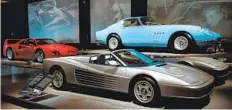  ?? JACK TAYLOR GETTY IMAGES ?? The Ferrari Testarossa, foreground, is pure 1980s.