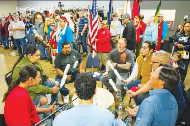  ?? Appeal-democrat ?? Drummers with Spirit Gourd from Fresno participat­e in the grand entry during the Yuba-sutter Winter Pow Wow in February 2020 at the Marysville Youth and Civic Center.