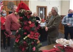  ?? Staff photo by Greg Bischof ?? ■ Arkansas 8th South Judicial District Judge Kirk Johnson, right, mingles with guests at his retirement reception Monday afternoon inside the Miller County Courthouse. Johnson has more than 40 years of judicial service in Southwest Arkansas.