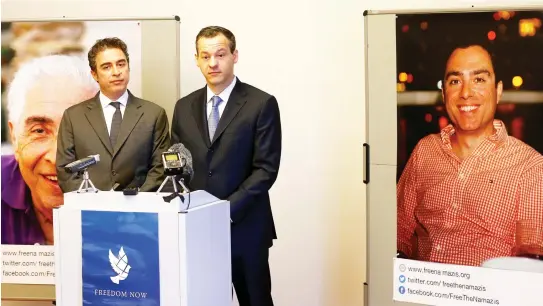  ??  ?? Lawyer Jared Genser and Babak Namazi, the brother and son of two prisoners in Iran — who hold both American and Iranian citizenshi­p and who have been sentenced to lengthy prison terms in Iran — address the media in Vienna. (Reuters)