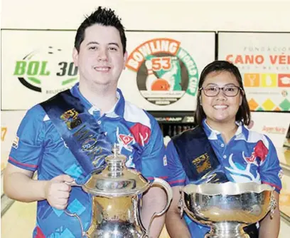  ??  ?? WORLD Cup women’s champion Krizziah Lyn Tabora (right) is shown with men’s winner Jakob Butturff at the close of the event in Hermosillo, Mexico.
