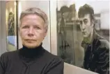  ?? ULRICH PERREY, DPA VIA AP ?? Astrid Kirchherr next to one of her images of John Lennon.