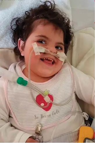  ??  ?? At four, Zopi Symeonidis can’t walk, talk, or eat by herself, and it’s not clear if she can see. But her parents simply cannot imagine life without their sweet girl, writes Carin Bevan