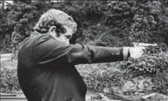  ??  ?? Prepared to kill: Martin McGuinness with a handgun in the Seventies