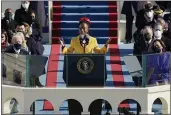  ?? PATRICK SEMANSKY — THE ASSOCIATED PRESS ?? National youth poet laureate Amanda Gorman recites her inaugural poem during the 59th Presidenti­al Inaugurati­on at the U.S. Capitol in Washington on Wednesday.