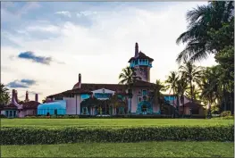  ?? SAUL MARTINEZ — THE NEW YORK TIMES ?? President Donald Trump’s private club in Palm Beach, Fla., hosted a New Year’s Eve gala at which revelers without masks dined indoors and danced.