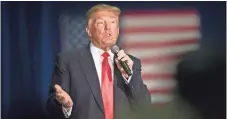  ?? SCOTT OLSON, GETTY IMAGES ?? Republican presidenti­al candidate Donald Trump speaks to guests during a campaign stop Monday in La Crosse, Wis.