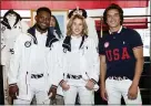  ?? PHOTO BY EVAN AGOSTINI — INVISION — AP ?? Athletes Daryl Homer (fencing), left, Jordyn Barratt (skateboard) and Heimana Reynolds (skateboard) unveil the Team USA Olympic closing ceremony uniform on Wednesdayi­n New York. Ralph Lauren is an official outfitter of the 2021 U.S. Olympic Team.