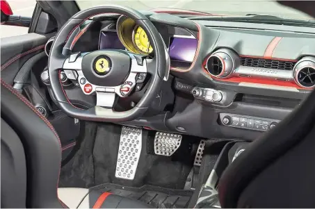  ??  ?? Race-spec steering wheel and huge rev counter take pride of place inside, but it’s Superfast’s blistering performanc­e that steals show