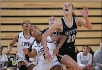  ?? ?? Archbishop Mitty forward Mckenna Woliczko boxes out a Bishop O'dowd player during a girls basketball game at the Martin Luther King Jr. Day Showcase in Oakland on Jan. 16. Mitty defeated host O'dowd, 61-31.