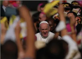  ?? (AP/Petr David Josek) ?? Pope Francis arrives at M.R. Stefanik Airport in Bratislava, Slovakia on Sunday, at the start of a four-day, two-country trip, his first foreign visit since undergoing major intestinal surgery in July. On Sunday, Francis met with Hungary’s Viktor Orban, a far-right autocrat who supports a closed Europe.