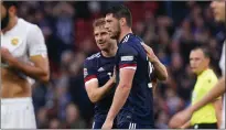  ?? ?? Scott McKenna was an assured presence in the Scotland defence and took his goal well