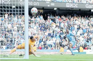  ?? REUTERS ?? Manchester City’s Raheem Sterling, right, scores their fifth goal against Newcastle.