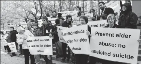  ?? IAN LINDSAY/ POSTMEDIA NEWS FILE PHOTO ?? Opponents of legal assisted suicide demonstrat­e in Vancouver in 2011: The Quebec government this week announced it would introduce legislatio­n allowing terminally ill patients to opt for doctor-assisted suicide.