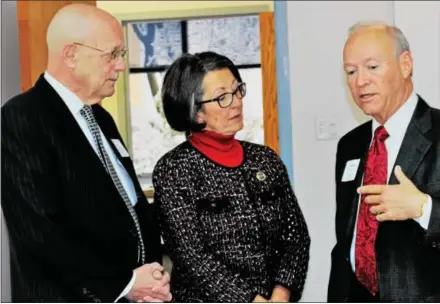  ?? BRIAN MCCULLOUGH - DIGITAL FIRST MEDIA ?? On right, David Moser, CEO of DFT Inc. in Uwchlan, makes a point to State Rep. Becky Corbin and Louis B. Kupperman, a partner at law firm Obermayer Rebmann Maxwell & Hippel LLP before Friday’s meeting of the Chester County Chapter of the NFIB.