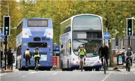  ??  ?? ‘In Bristol there have been awkward questions about whether a ban would be fair on sick and frail people trying to reach hospitals inside the zone.’ Cyclists and buses in Bristol city centre. Photograph: Ben Birchall/PA
