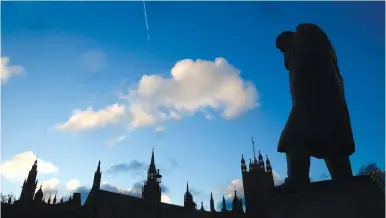  ?? (Reuters) ?? A STATUE of Churchill in the UK. Can we learn from his desire for victory?