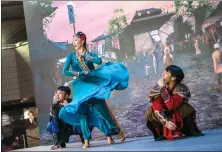  ?? ANDY CHONG / CHINA DAILY ?? Performers of the dance drama Five Stars Rise in the East give a brief demonstrat­ion of their show during the media briefing.