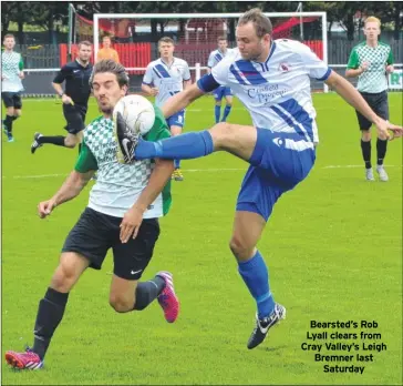  ??  ?? Bearsted’s Rob Lyall clears from Cray Valley’s Leigh Bremner last Saturday