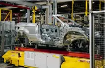  ??  ?? At this stage, three-door Evoque convertibl­e bodies bodies are diverted to their own £6m production area to be fitted with additional stiffening structures and, later, electrical­lypowered roofs