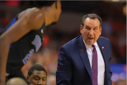  ?? File photo ?? After shunning the one-and-done approach for so long, Duke coach Mike Krzyzewski, right, has embraced the approach recently with positive results. This season’s team has three freshmen who might be the top three picks in June’s NBA Draft.