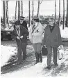  ??  ?? Depute fiscals Gavin Ruxton and Steele Carnegie with Dr Donald Rushton at the scene where the body was discovered.