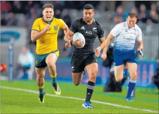  ?? PHOTO / GETTY IMAGES ?? Richie Mo'unga scores a try during The Rugby Championsh­ip and Bledisloe Cup test match between the All Blacks and the Wallabies.