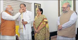  ?? PTI PHOTO ?? Prime Minister Narendra Modi and BJP chief Amit Shah with vicepresid­ent elect Venkaiah Naidu at his residence in New Delhi on Saturday.