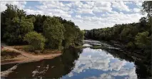  ?? AJC FILE ?? After first targeting Chattahooc­hee River water usage in metro Atlanta, Florida zeroed in on southwest Georgia as the main culprit. It said farmers near the Flint River took out too much for irrigation.