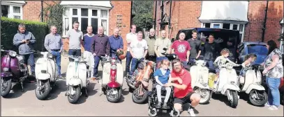  ??  ?? ■ Loughborou­gh’s Blazing Glory Scooter Club has unveiled ‘Reverse Rett’ as its chosen charity for its annual birthday fund-raiser later this month. Members of the Blazing Glory Scooter Club pictured with David Wainwright and his daughter Georgia.