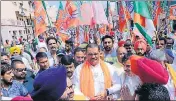  ?? SAMEER SEHGAL/HT ?? BJP state chief Vijay Sampla with other party leaders during the ‘sankalp yatra’ in Amritsar on Tuesday.