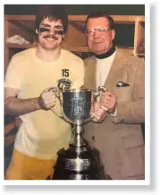  ??  ?? TOP: Stu and Kim Lang after a Canadian Football League game in Edmonton, where Stu played from 1974 to 1981. ABOVE: Stu Lang and his father, Gordon, with the Grey Cup. Edmonton won five championsh­ips during Stu’s playing career.