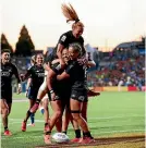  ?? ?? Happy days: Stacey Fluhler, left, is hoisted high after a winning effort at Hamilton in 2020. Right: Eric Rush is raised onto his teammates’ shoulders after beating England in 2003.