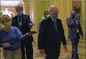  ?? SUSAN WALSH — THE ASSOCIATED PRESS ?? Senate Majority Leader Mitch McConnell walks past reporters on Capitol Hill in Washington on Tuesday.