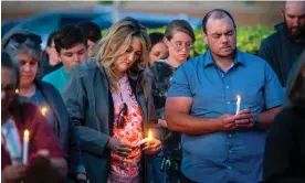  ?? Photograph: Jon Austria/Albuquerqu­e Journal/ZUMA/Shuttersto­ck ?? Farmington city council members participat­e in a vigil at Hills church in Farmington, New Mexico.