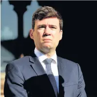  ??  ?? ●●Greater Manchester Mayor Andy Burnham at a vigil to honour those killed in the Manchester Arena bombing in May