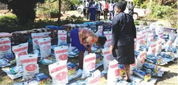  ?? — Picture by Tinai Nyadzayo ?? A group of 50 elderly people received food hampers, blankets, face masks, hand sanitisers and detergents from the First Lady Amai Mnangagwa’s Angel of Hope Foundation last week on Friday