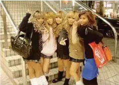  ??  ?? My many media trips to Tokyo were always refreshing. That’s me (right) with my harajuku blondies.