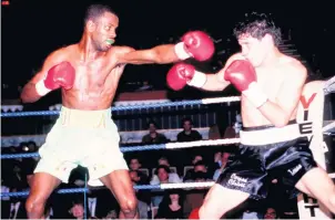 ??  ?? Duke Mckenzie (left) in world title action against Jesse Benavides in October 1992