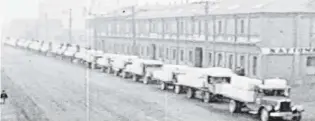  ?? PHOTO: JOE ENRIGHT ?? A frame from a silent movie made for J.K. Mooney &amp; Co in the early 1930s to publicise Dunedin’s fur exports. This convoy carrying 298 bales of rabbit skins was said to be the largest single shipment ever sent from the city.