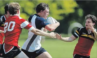  ?? CLIFFORD SKARSTEDT EXAMINER ?? Thomas A. Stewart’s Tye Wesenberg outruns the Bayside defence during COSSA AAA boys rugby championsh­ip action on Wednesday. TASSS beat Bayside 46-0 to advance to OFSAA next week in London.