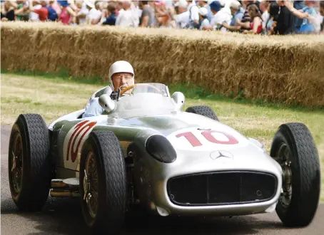  ?? Files/AFP ?? In this file photo taken on July 5, 2009 Britain’s Stirling Moss drives his 1954 Mercedes Benz W196 racing car at Goodwood’s Festival of Speed.