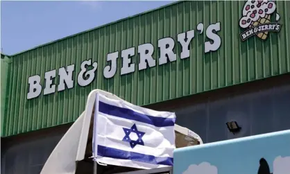  ??  ?? An Israeli flag on a delivery truck outside US ice-cream maker Ben & Jerry’s factory in Be’er Tuvia, Israel, 21 July 2021. Photograph: Emmanuel Dunand/AFP/Getty Images