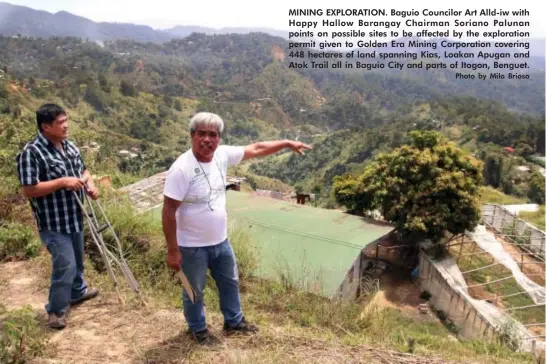  ??  ?? MINING EXPLORATIO­N. Baguio Councilor Art Alld-iw with Happy Hallow Barangay Chairman Soriano Palunan points on possible sites to be affected by the exploratio­n permit given to Golden Era Mining Corporatio­n covering 448 hectares of land spanning Kias, Loakan Apugan and Atok Trail all in Baguio City and parts of Itogon, Benguet. Photo by Milo Brioso