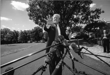  ??  ?? President Donald Trump speaks with reporters before departing on Marine One on the South Lawn of the White House, on Wednesday in Washington. AP PhoTo/ Alex BrAndon