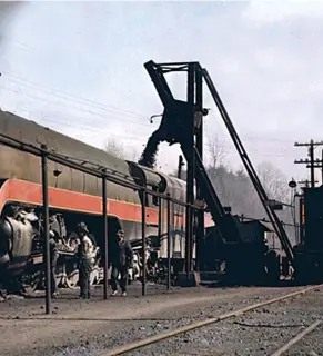  ??  ?? Left: J-class 4-8-4 604, having come in with the Pelican, is coaled and inspected on March 2, 1957. After turning and further servicing, the 4-8-4 will depart with mail train 10.