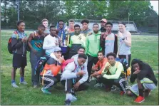  ?? STAFF PHOTO BY MICHAEL REID ?? The Westlake boys track and field team celebrate their team title at the SMAC track and field championsh­ips Thursday at Great Mills.