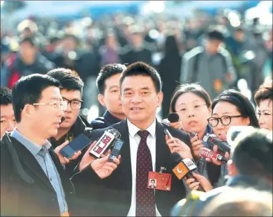  ?? WEI LIANG / CHINA NEWS SERVICE ?? Liu Yonghao, chairman of New Hope Group, speaks to mediaperso­ns on the sidelines of the annual two sessions of the national legislatur­e and political advisory body in Beijing last week.