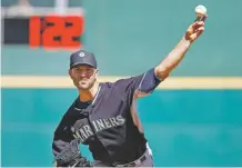  ?? ASSOCIATED PRESS FILE PHOTO ?? The Mariners’ J.A. Happ pitches during a 2015 spring training baseball game against the Reds in Goodyear, Ariz. Major League Baseball and its players are discussing bold changes to spark the sport that include a three-batter minimum before a pitching change except at the start of an inning, a single trade deadline set before the All-Star break and expanding rosters.