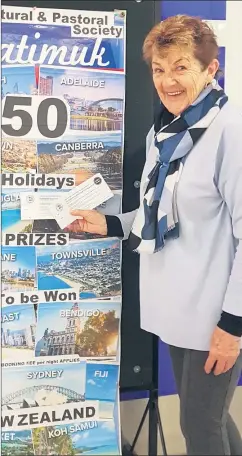  ??  ?? PRIZE POTENTIAL: Natimuk Agricultur­al and Pastoral Society committee member Lois Trimble, also a member of Stawell society, promotes a major raffle.